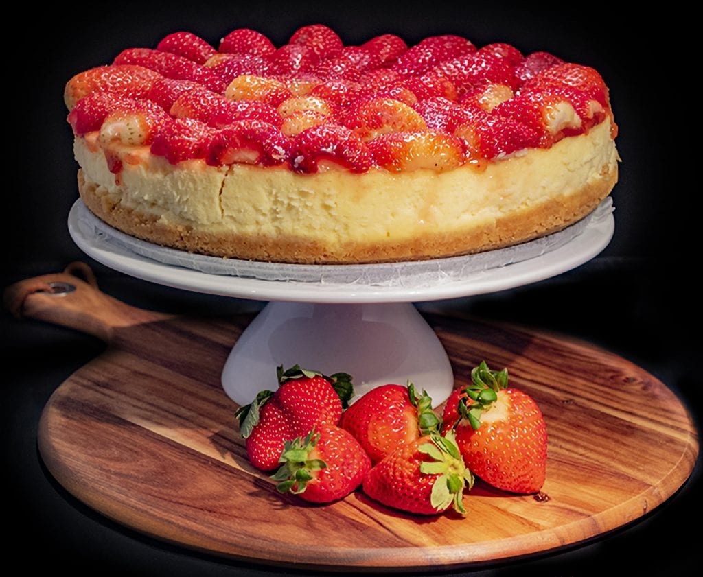 cheesecake topped with strawberries