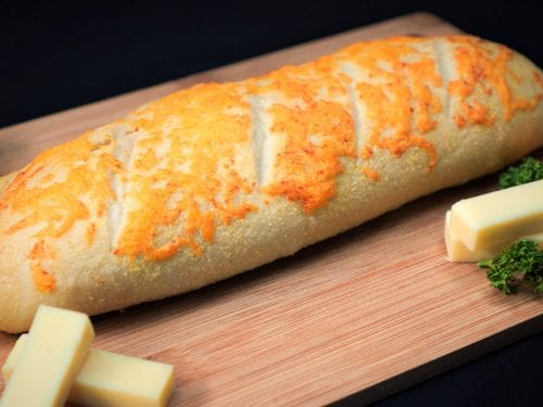 Addictive Domino’s Cheesy Bread Copycat Recipe - homemade cheesy bread with garlic powder and butter