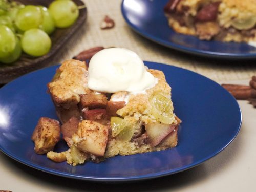 Apple Grape Crumble Recipe, crumble dessert with apples, grapes, and vanilla ice cream topping