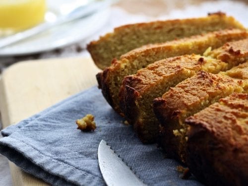 pumpkin bread on a blue kitchen towel