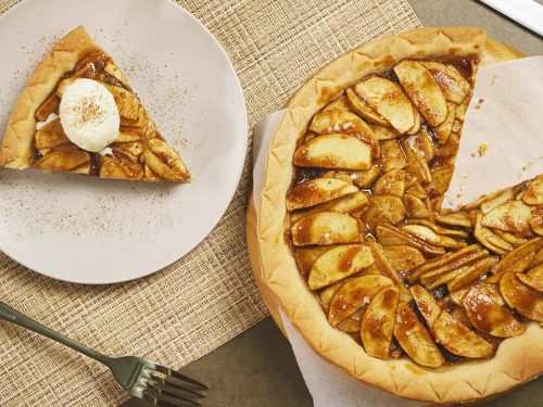 open face pie and a slice topped with ice cream