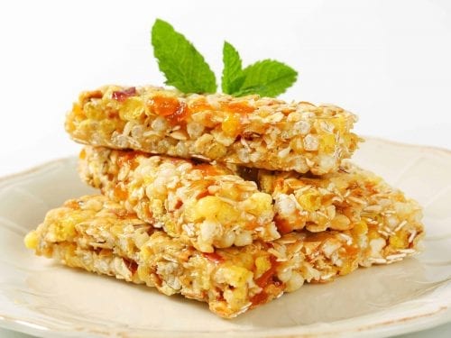 apricot oatmeal bars on a white plate