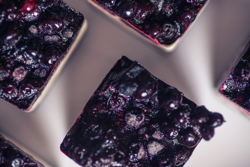 top shot of several blueberry cheesecake squares