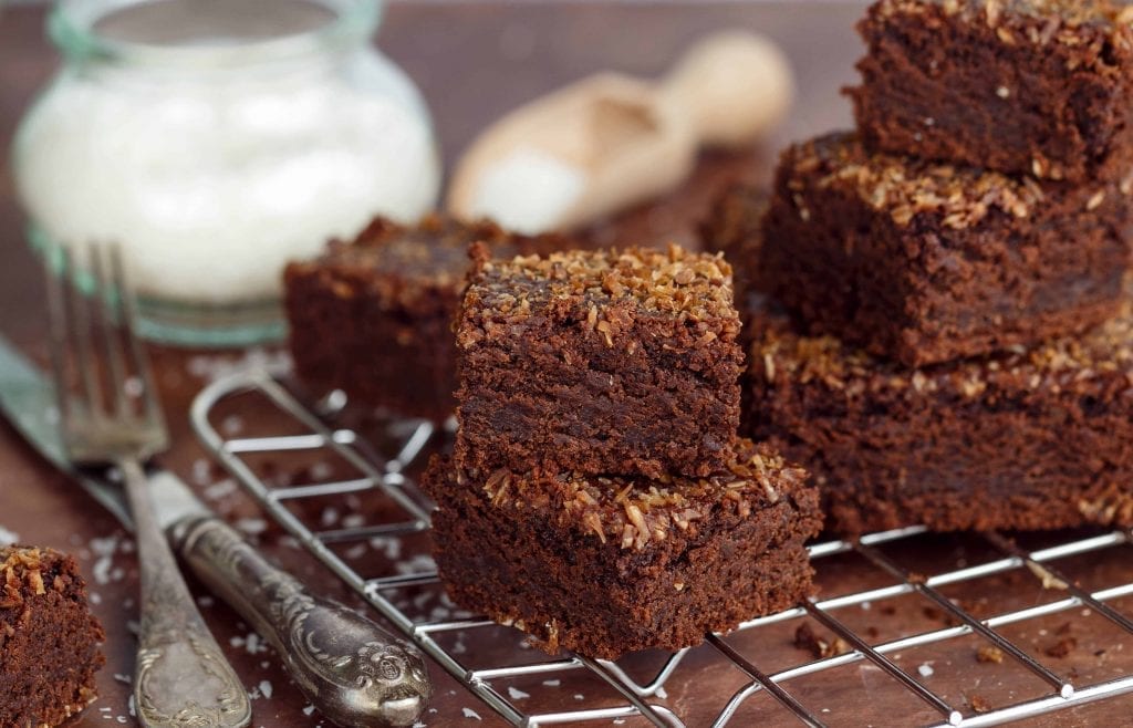 coconut brownies on a cooling rack