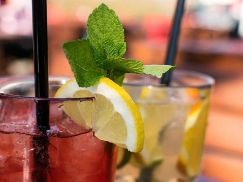 cold fresh lemonade with raspberry ice cubes