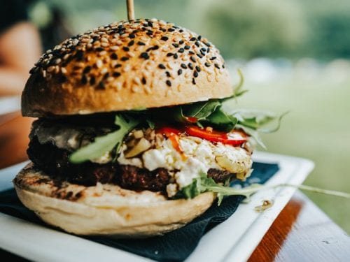 Greek-Style Burgers with Tzatziki Recipe, homemade hamburger with feta cheese and tzatziki sauce