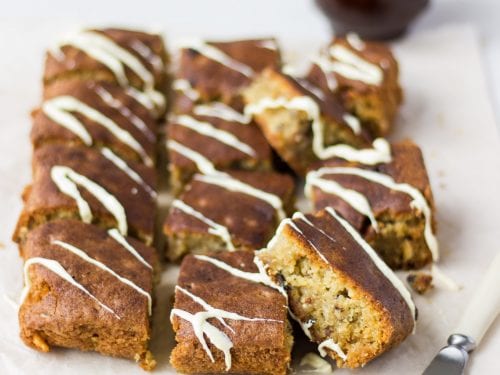 dessert bars cut into squares and drizzled with a white glaze