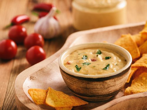 Chili and Cheese Dip Recipe, chili queso dip with green onions, cream cheese, black beans