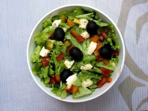 fried feta cheese and black olives with oregano