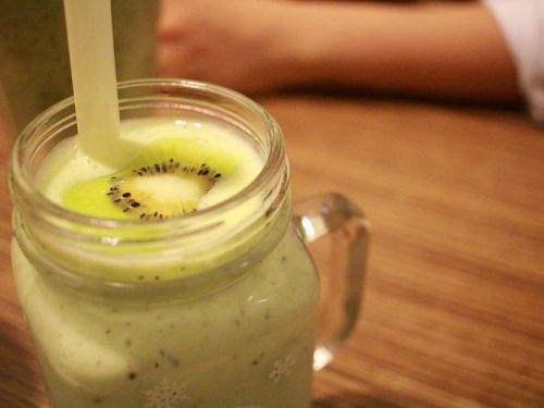 cold kiwi fruit and fresh banana smoothie