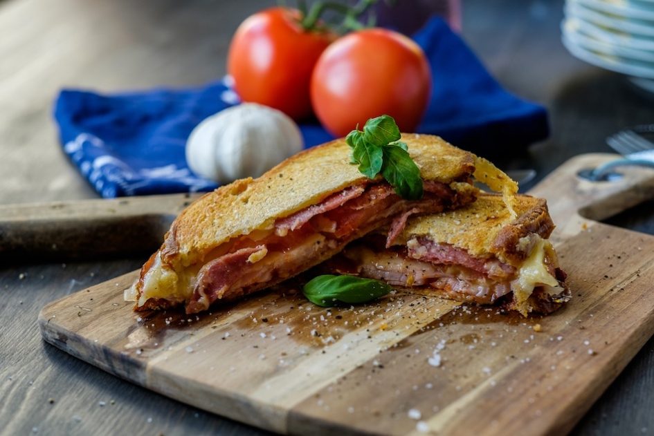 sizzling grilled honey ham, turkey, tomatoes and mozzarella panini