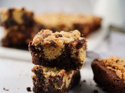 a close up of cookie dough brownies