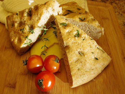 rosemary focaccia bread with cherry tomatoes and cheese