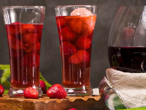 Heart-shaped fruit punch-flavored ice cubes in soda glasses