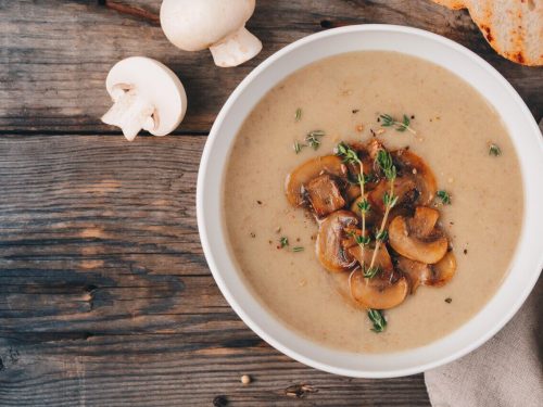 Gluten Free Cream of Mushroom Soup Recipe, a bowl of gluten free cream of mushroom soup with fresh mushrooms