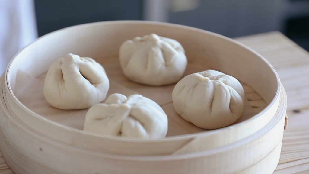 meat buns on a steamer