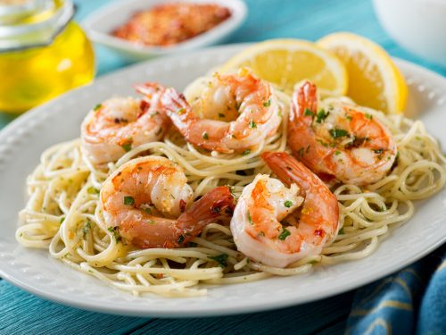 Shrimp Scampi Olive Garden Recipe Copycat, A delicious plate of shrimp scampi with spaghetti and lemon