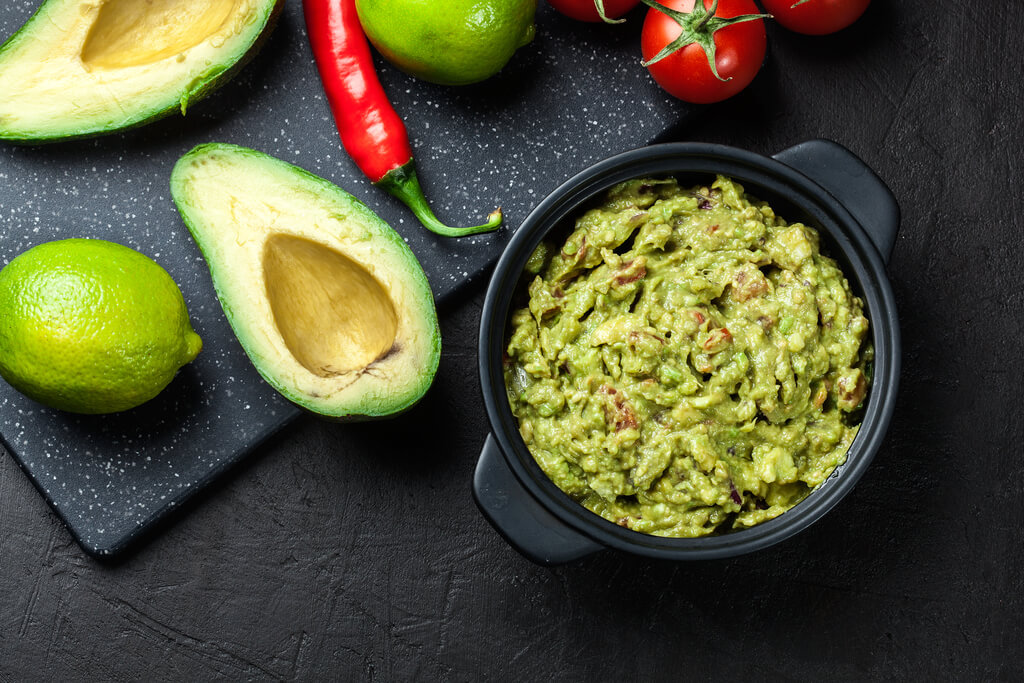 sliced avocado and guacamole 