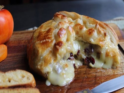 Baked Stuffed Brie with Cranberries & Walnuts