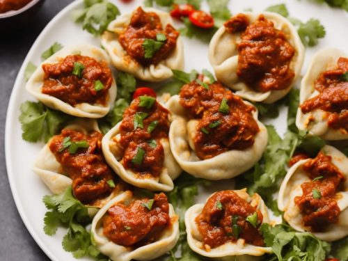 Chicken Momos with Nepalese Roasted Tomato Chutney