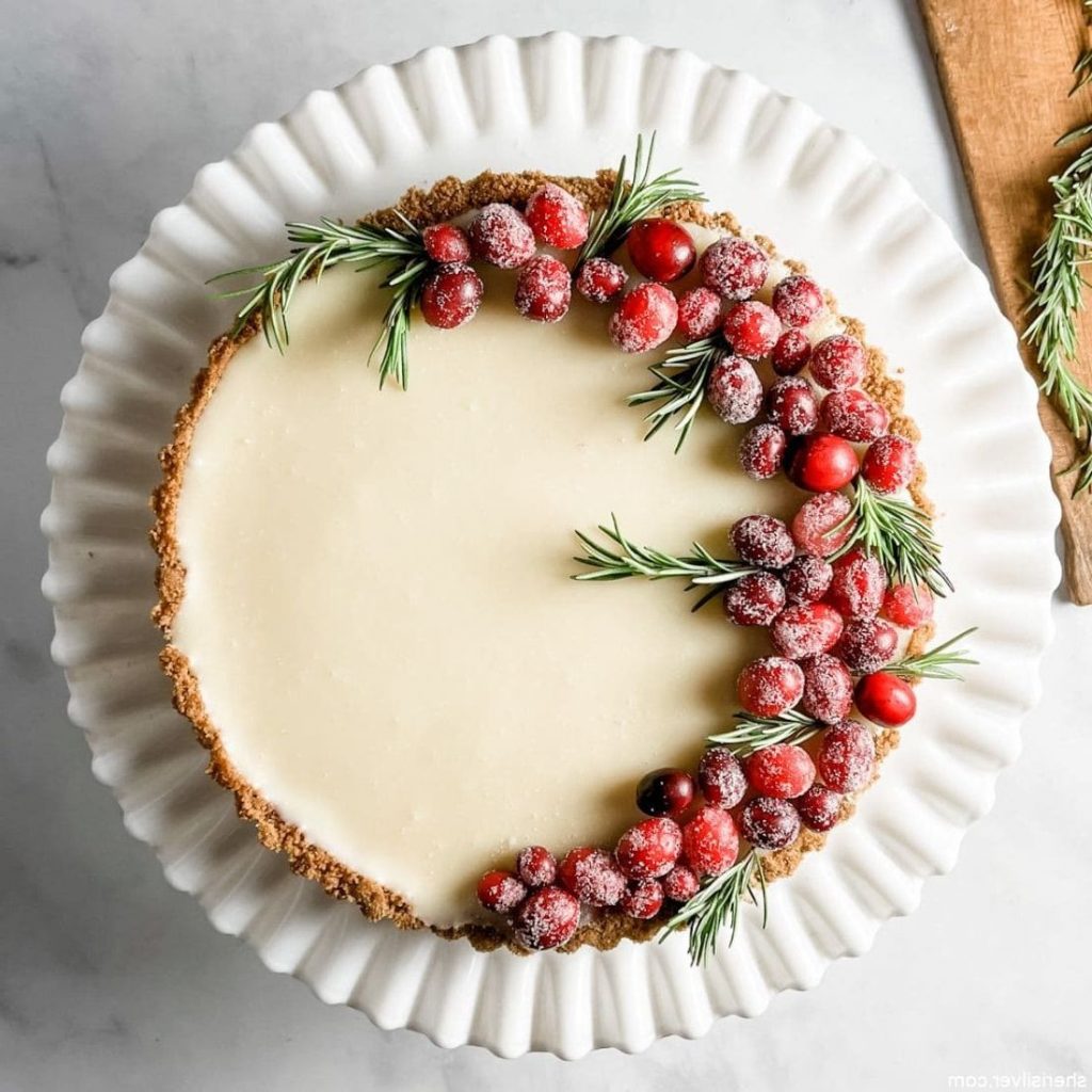 Cranberry-crowned pud with white chocolate custard