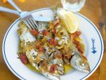 Mackerel with sizzled garlic, ginger & tomatoes