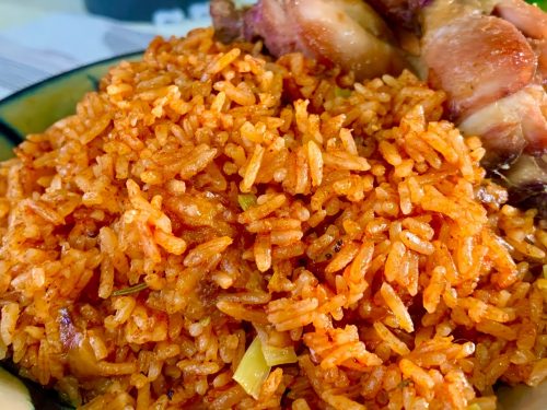 Nigerian Jollof Rice with Chicken and Fried Plantains