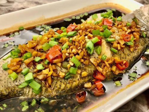 Steamed bass with garlic & chilli