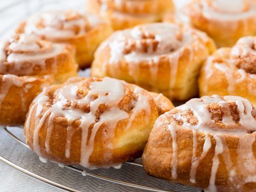 apple pie cinnamon rolls drizzled with sweet glaze