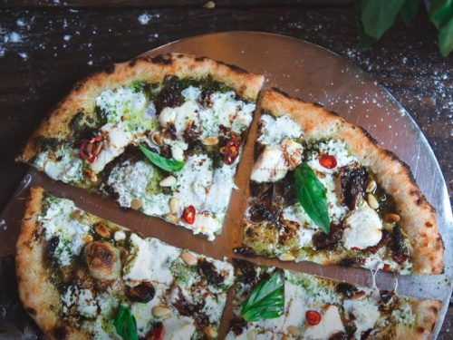 butternut squash ribbon goat cheese pizza with arugula-pepita pesto recipe