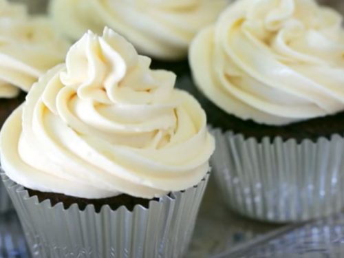 chocolate pinata cupcake with cream cheese frosting