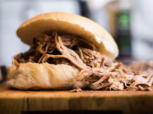 Instant Pot Pulled Pork Recipe - Tender pulled pork in a bun