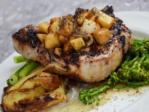 Mahogany Pork Chops Recipe - Pan seared pork chops that have been marinated in a mixture of teriyaki sauce and molasses.