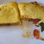 open-faced omelet with feta, roasted tomatoes, and spinach recipe